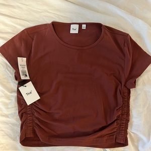 tna chill Malibu t-shirt, size small, colour is dark maroon.